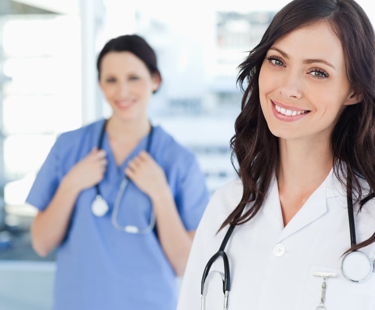 two nurse practitioners smiling